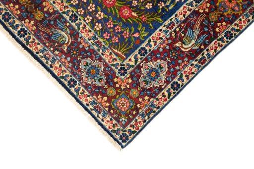Backside of handmade 1920s Yazd rug showing knot structure and weave density