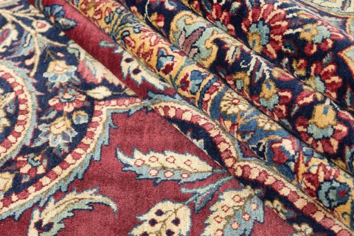 Corner detail of 1930s Yazd rug showing border pattern and Wool pile
