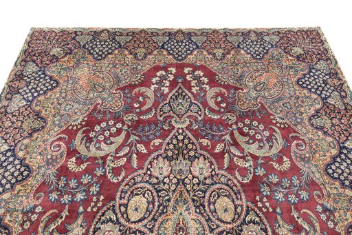 Surface texture of 1930s Yazd rug with natural Wool and intricate pattern