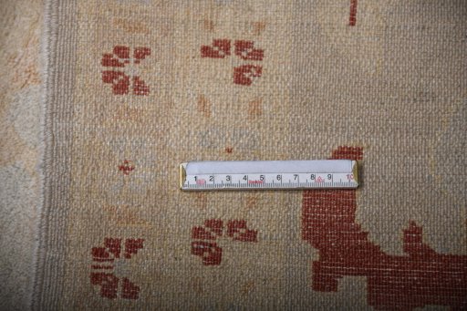 Corner detail of New Yazd rug showing border pattern and Wool pile