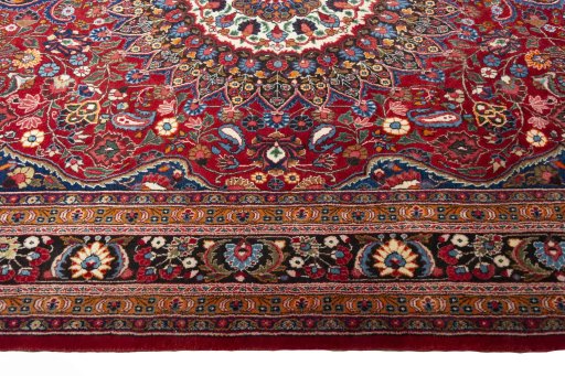 Corner detail of 2000s Yazd rug showing border pattern and Wool pile