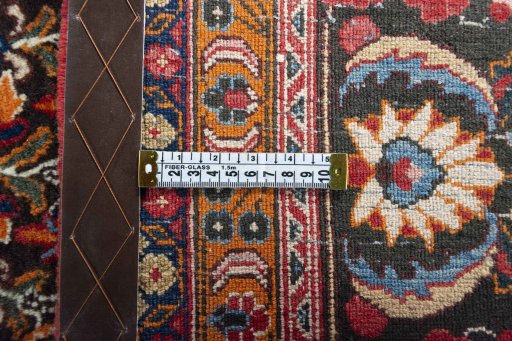 Backside of handmade 2000s Yazd rug showing knot structure and weave density