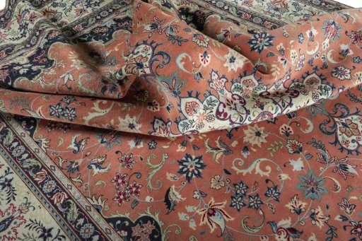 Surface texture of 2000s Yazd rug with natural Wool and intricate pattern