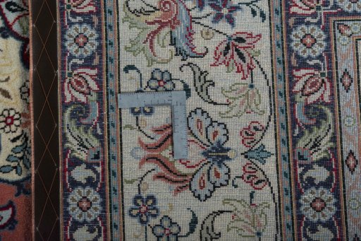 Backside of handmade 2000s Yazd rug showing knot structure and weave density