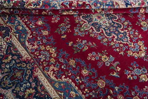 Close-up detail of 1970s Yazd rug from Iran / Persia showing Wool weave