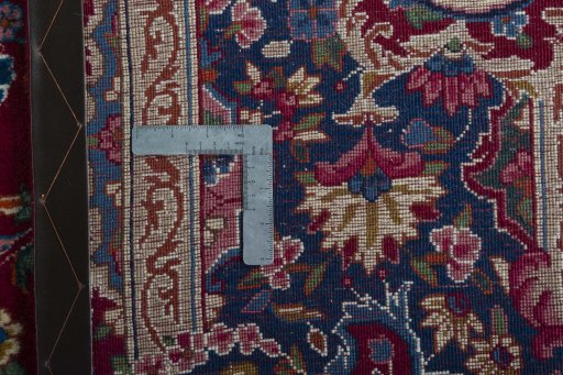 Backside of handmade 1970s Yazd rug showing knot structure and weave density