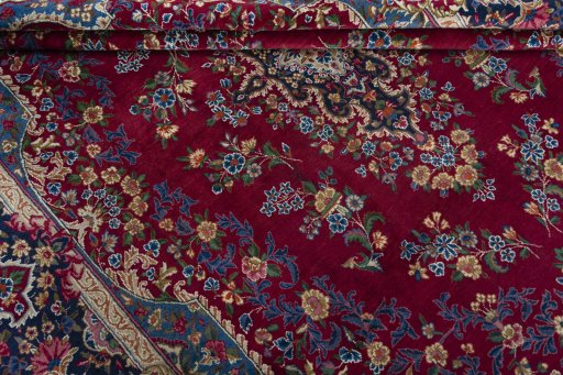 Close-up detail of 1970s Yazd rug from Iran / Persia showing Wool weave