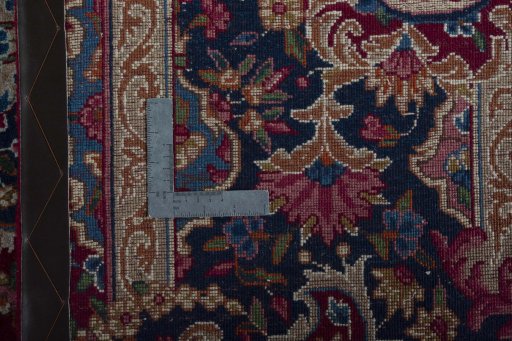 Backside of handmade 1970s Yazd rug showing knot structure and weave density