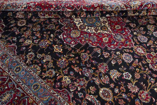 Close-up detail of 2000s Yazd rug from Iran / Persia showing Wool weave