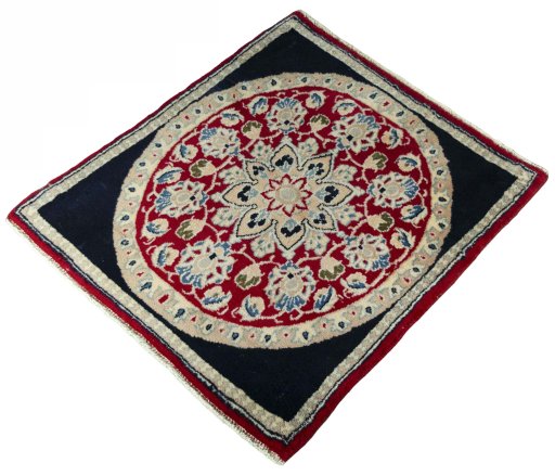 Corner detail of 2000s Yazd rug showing border pattern and Wool pile