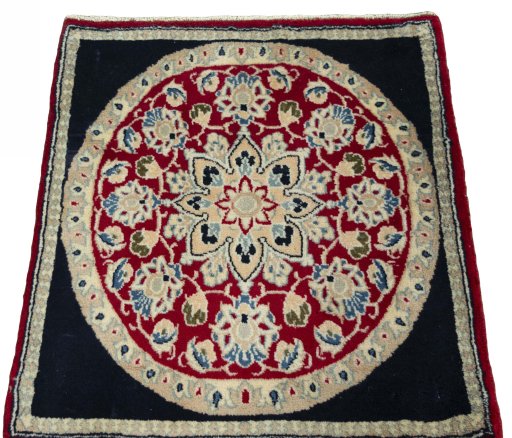 Surface texture of 2000s Yazd rug with natural Wool and intricate pattern
