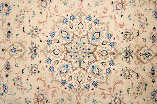 Corner detail of 2000s Yazd rug showing border pattern and Wool pile