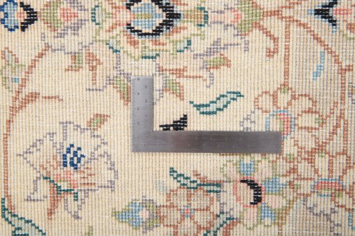 Surface texture of 2000s Yazd rug with natural Wool and intricate pattern