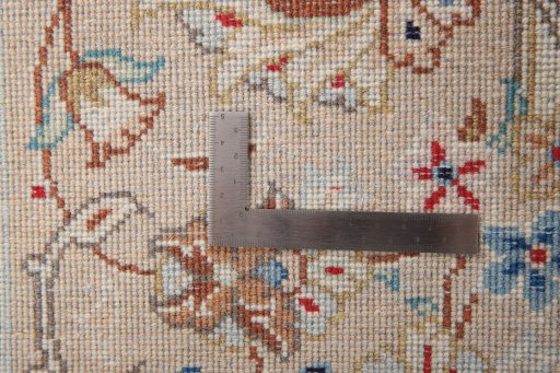 Surface texture of 2000s Yazd rug with natural Wool and intricate pattern