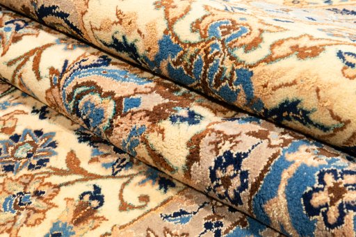 Backside of handmade New Nain 6La with Silk rug showing knot structure and weave density