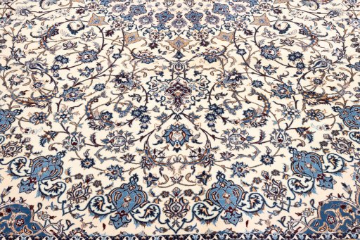 Corner detail of 2020s Nain 6La with Silk rug showing border pattern and Wool pile