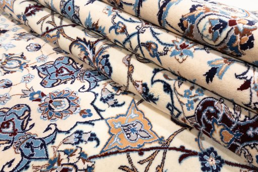 Surface texture of 2020s Nain 6La with Silk rug with natural Wool and intricate pattern