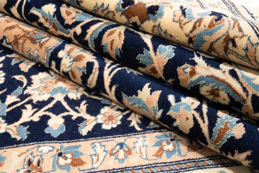 Surface texture of 2019s Nain 6La with Silk rug with natural Wool and intricate pattern