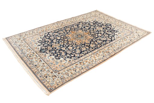 Corner detail of 2019s Nain 6La with Silk rug showing border pattern and Wool pile