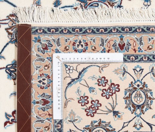 Surface texture of New Nain 6La with Silk rug with natural Wool and intricate pattern
