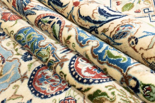 Backside of handmade New Nain 6La with Silk rug showing knot structure and weave density