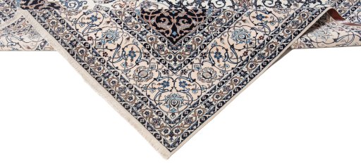 Corner detail of New Nain 6La with Silk rug showing border pattern and Wool pile