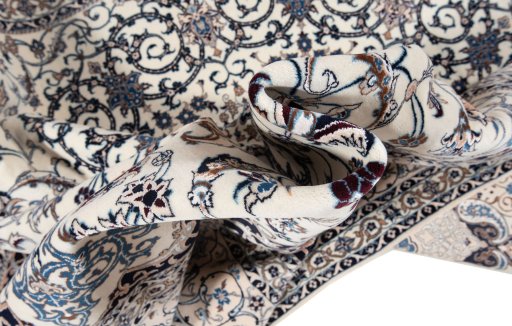 Corner detail of New Nain 6La with Silk rug showing border pattern and Wool pile