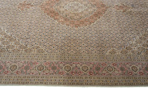 Corner detail of New Tabriz 50/60/70 Raj rug showing border pattern and Cork pile