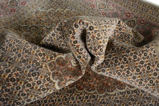 Surface texture of New Tabriz 50/60/70 Raj rug with natural Cork and intricate pattern