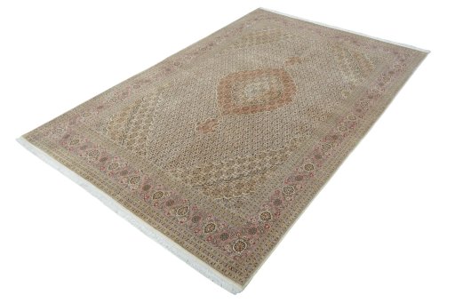 Corner detail of New Tabriz 50/60/70 Raj rug showing border pattern and Cork pile