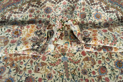 Corner detail of New Tabriz 50/60/70 Raj rug showing border pattern and Cork pile