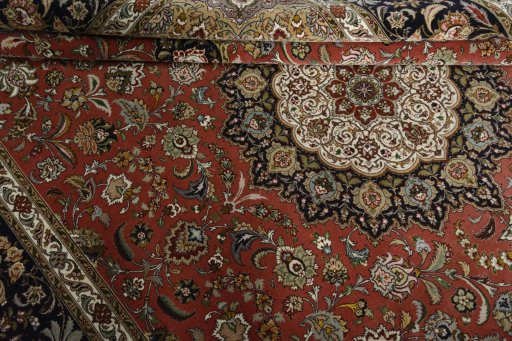 Corner detail of New Tabriz 50/60/70 Raj rug showing border pattern and Cork pile