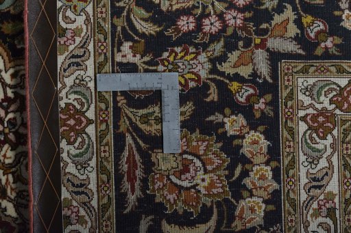 Surface texture of New Tabriz 50/60/70 Raj rug with natural Cork and intricate pattern
