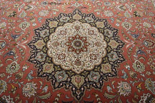 Backside of handmade New Tabriz 50/60/70 Raj rug showing knot structure and weave density
