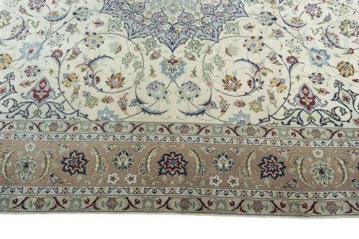 Corner detail of New Tabriz 50/60/70 Raj rug showing border pattern and Cork pile