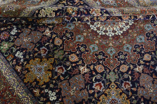 Surface texture of 1970s Tabriz 50/60/70 Raj rug with natural Cork and intricate pattern