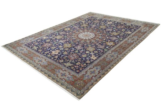 Corner detail of 1970s Tabriz 50/60/70 Raj rug showing border pattern and Cork pile