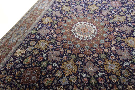 Backside of handmade 1970s Tabriz 50/60/70 Raj rug showing knot structure and weave density