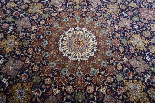 Central medallion detail of 1970s Tabriz 50/60/70 Raj rug from Iran / Persia