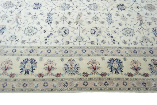 Corner detail of New Tabriz 50/60/70 Raj rug showing border pattern and Cork pile
