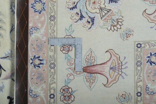 Backside of handmade New Tabriz 50/60/70 Raj rug showing knot structure and weave density