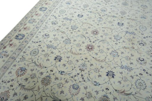 Backside of handmade New Tabriz 50/60/70 Raj rug showing knot structure and weave density