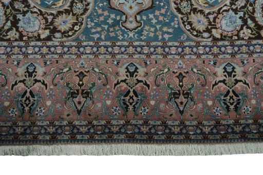 Corner detail of 1970s Tabriz 50/60/70 Raj rug showing border pattern and Cork pile