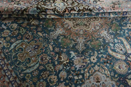 Surface texture of 1970s Tabriz 50/60/70 Raj rug with natural Cork and intricate pattern