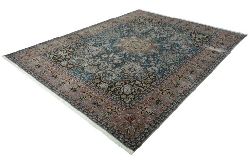 Corner detail of 1970s Tabriz 50/60/70 Raj rug showing border pattern and Cork pile