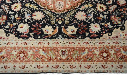 Corner detail of New Tabriz 50/60/70 Raj rug showing border pattern and Cork pile