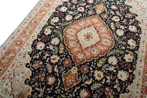 Backside of handmade New Tabriz 50/60/70 Raj rug showing knot structure and weave density