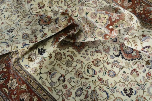 Backside of handmade New Tabriz 50/60/70 Raj rug showing knot structure and weave density