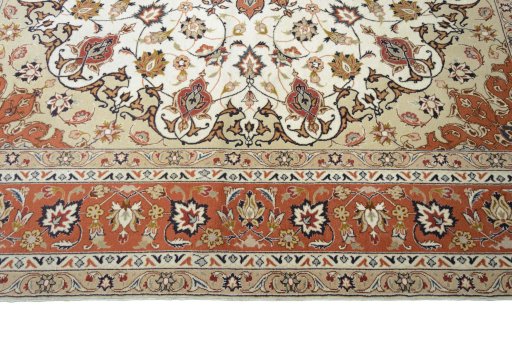 Corner detail of New Tabriz 50/60/70 Raj rug showing border pattern and Cork pile
