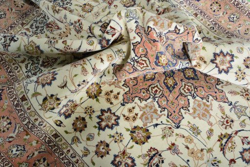 Backside of handmade New Tabriz 50/60/70 Raj rug showing knot structure and weave density